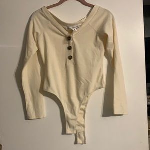 Pink lily long sleeve ivory bodysuit